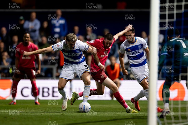 020926 - Queens Park Rangers v Cardiff City - Sky Bet Championship - Jimmy Dunne of Queens Park Rangers and Jack Moylan of Cardiff City battle for the ball