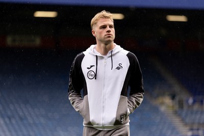 241026 - Queens Park Rangers v Swansea City - Sky Bet Championship - Stephen Welsh of Swansea City walks on the pitch prior to the game