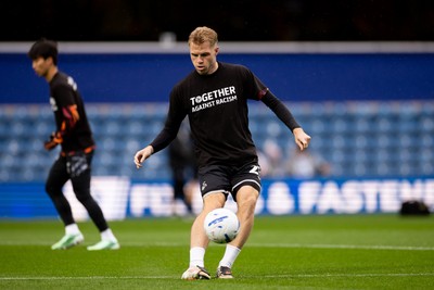 241026 - Queens Park Rangers v Swansea City - Sky Bet Championship - Stephen Welsh of Swansea City warming up