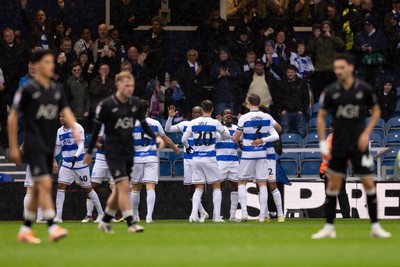 241026 - Queens Park Rangers v Swansea City - Sky Bet Championship - Richard Kon� of Queens Park Rangers celebrates with his teammates after scoring a goal