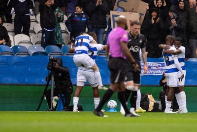 241026 - Queens Park Rangers v Swansea City - Sky Bet Championship - Richard Kon� of Queens Park Rangers celebrates with his teammates after scoring his sides second goal