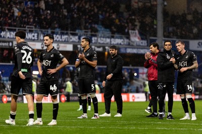 241026 - Queens Park Rangers v Swansea City - Sky Bet Championship - Players of Swansea City look dejected after their sides defeat