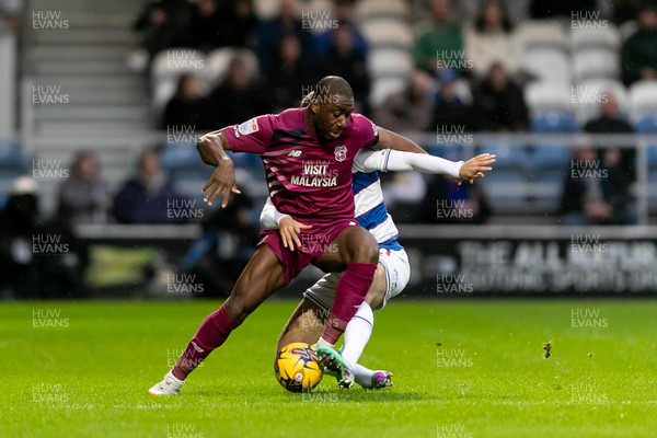 010124 - Queens Park Rangers v Cardiff City - Sky Bet Championship - Yakou Meite of Cardiff City battles for the ball with Ziyad Larkeche of Queens Park Rangers 
