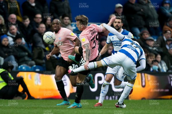 050322 - Queens Park Rangers v Cardiff City - Sky Bet Championship - Isaak Davies of Cardiff City battle for the ball