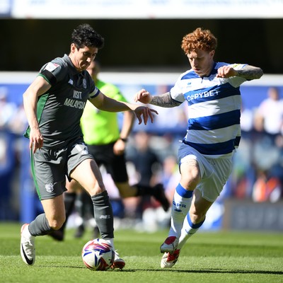 050425 - Queens Park Rangers v Cardiff City - Sky Bet Championship - Callum O'dowda of Cardiff City is challenged by Jack Colback of Queens Park Rangers
