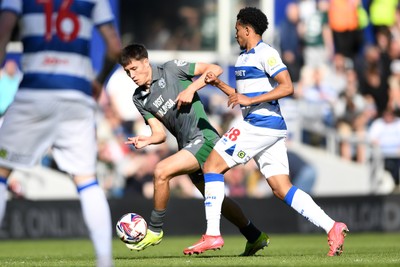 050425 - Queens Park Rangers v Cardiff City - Sky Bet Championship - Rubin Colwill of Cardiff City is challenged by Alfie Lloyd of Queens Park Rangers