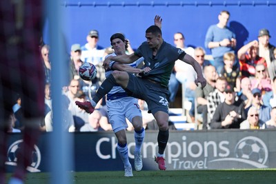 050425 - Queens Park Rangers v Cardiff City - Sky Bet Championship - Yousef Salech of Cardiff City is challenged by Ronnie Edwards of Queens Park Rangers
