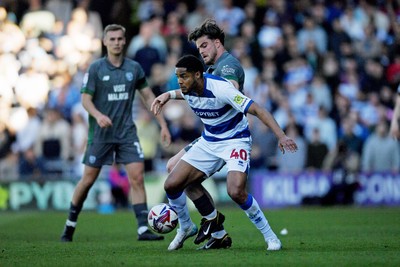 050425 - Queens Park Rangers v Cardiff City - Sky Bet Championship - Ollie Tanner of Cardiff City is challenged by Johnathan Varane of Queens Park Rangers