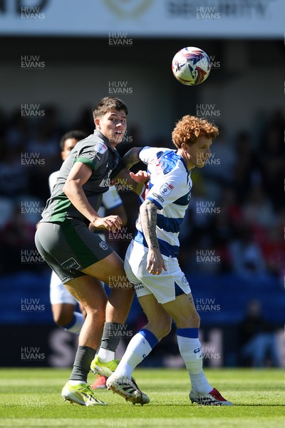 050425 - Queens Park Rangers v Cardiff City - Sky Bet Championship - Rubin Colwill of Cardiff City is challenged by Jack Colback of Queens Park Rangers