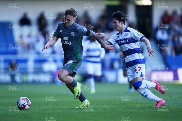 050425 - Queens Park Rangers v Cardiff City - Sky Bet Championship - Isaak Davies of Cardiff City is challenged by Yang Min-Hyeok of Queens Park Rangers