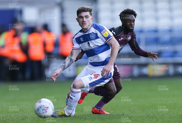 130419 - Queens Park Rangers v Swansea City, Sky Bet Championship - Nathan Dyer of Swansea City plays the ball past Ryan Manning of Queens Park Rangers