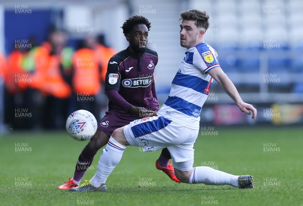 130419 - Queens Park Rangers v Swansea City, Sky Bet Championship - Nathan Dyer of Swansea City plays the ball past Ryan Manning of Queens Park Rangers