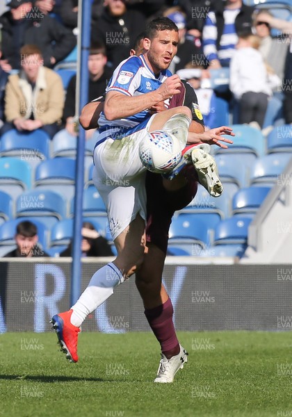 130419 - Queens Park Rangers v Swansea City, Sky Bet Championship - Tomer Hemed of Queens Park Rangers wins the ball from Cameron Carter-Vickers of Swansea City