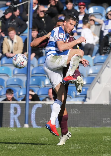 130419 - Queens Park Rangers v Swansea City, Sky Bet Championship - Tomer Hemed of Queens Park Rangers wins the ball from Cameron Carter-Vickers of Swansea City