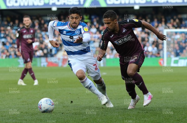 130419 - Queens Park Rangers v Swansea City, Sky Bet Championship - Wayne Routledge of Swansea City takes on Massimo Luongo of Queens Park Rangers