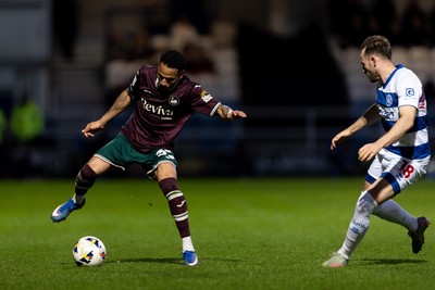210426 - Queens Park Rangers v Swansea City - Sky Bet Championship - Ronald of Swansea City faces Rhys Norrington-Davies of Queens Park Rangers