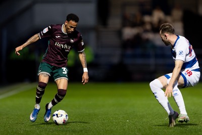 210426 - Queens Park Rangers v Swansea City - Sky Bet Championship - Ronald of Swansea City faces Rhys Norrington-Davies of Queens Park Rangers