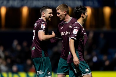 210426 - Queens Park Rangers v Swansea City - Sky Bet Championship - Zan Vipotnik of Swansea City celebrates with his teammate Jay Fulton of Swansea City after scoring his sides second goal
