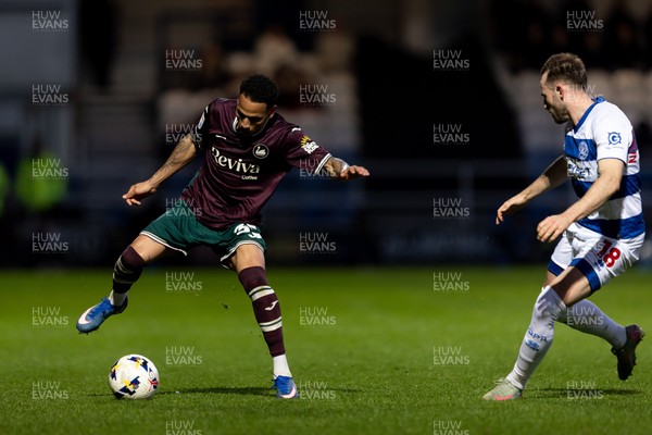 210426 - Queens Park Rangers v Swansea City - Sky Bet Championship - Ronald of Swansea City faces Rhys Norrington-Davies of Queens Park Rangers