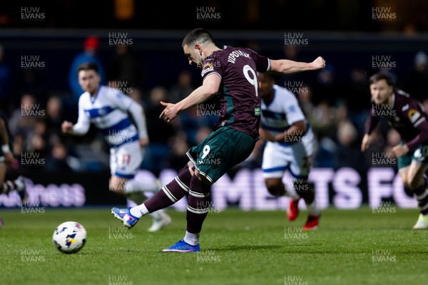 210426 - Queens Park Rangers v Swansea City - Sky Bet Championship - Zan Vipotnik of Swansea City takes a penalty kick
