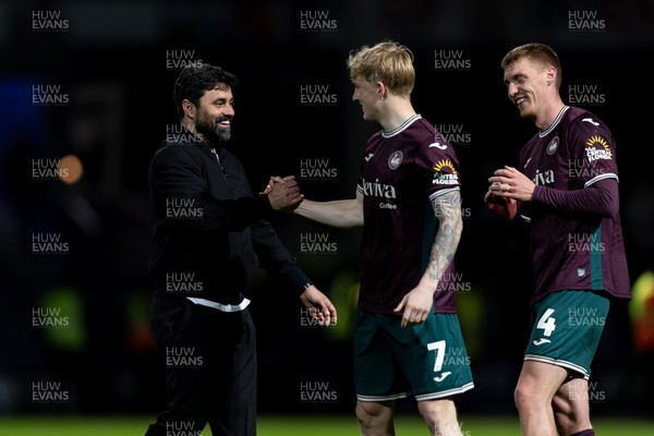 210426 - Queens Park Rangers v Swansea City - Sky Bet Championship - Vítor Matos manager of Swansea City shake hands with Melker Widell of Swansea City after their sides victory