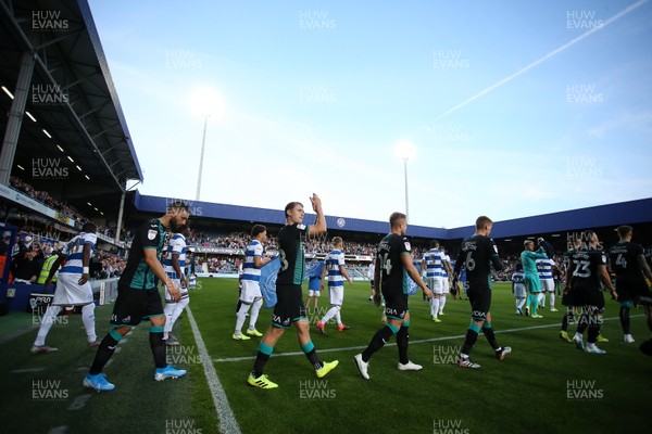 210819 - Queens Park Rangers v Swansea City  - SkyBet Championship - George Byers of Swansea City looks towards the fans as they walk out onto the pitch