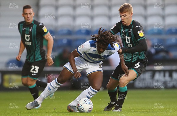 210819 - Queens Park Rangers v Swansea City  - SkyBet Championship - Eberechi Eze of QPR is tackled by Jay Fulton of Swansea City