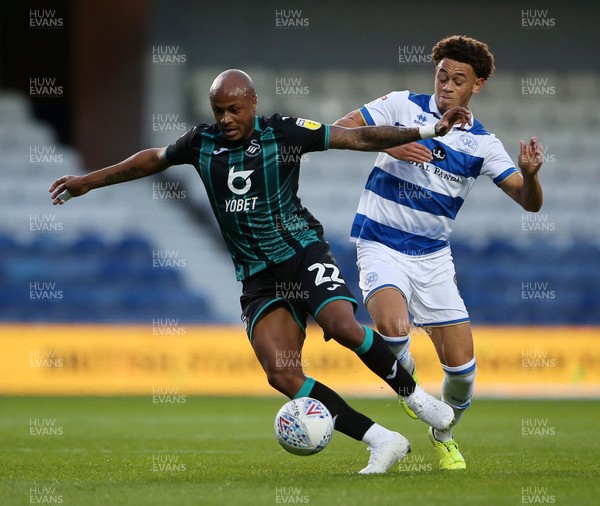 210819 - Queens Park Rangers v Swansea City  - SkyBet Championship - Andre Ayew of Swansea City is challenged by Luke Amos of QPR