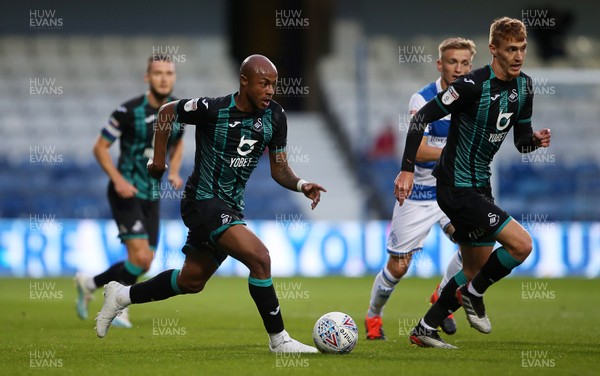 210819 - Queens Park Rangers v Swansea City  - SkyBet Championship - Andre Ayew and Jay Fulton of Swansea City run the ball up field