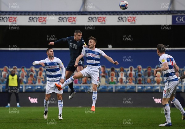 261220 - Queens Park Rangers v Swansea City - Sky Bet Championship - Jake Bidwell of Swansea City heads at goal leading to their first goal
