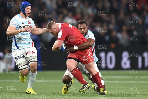 190119 - Racing 92 v Scarlets - European Rugby Heineken Champions Cup -  Samson Lee of Scarlets is tackled by Leone Nakarawa of Racing 92