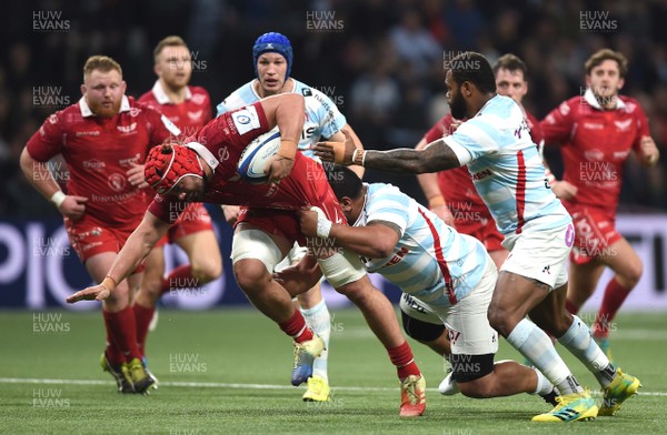 190119 - Racing 92 v Scarlets - European Rugby Heineken Champions Cup -  Joshua Macleod of Scarlets is tackled by Census Johnston of Racing 92