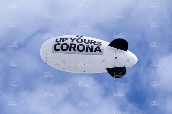 280720 - Picture shows Radio 1's blimp, which says 'Up yours Corona' on the side as it flies above Bute Park looking over Cardiff