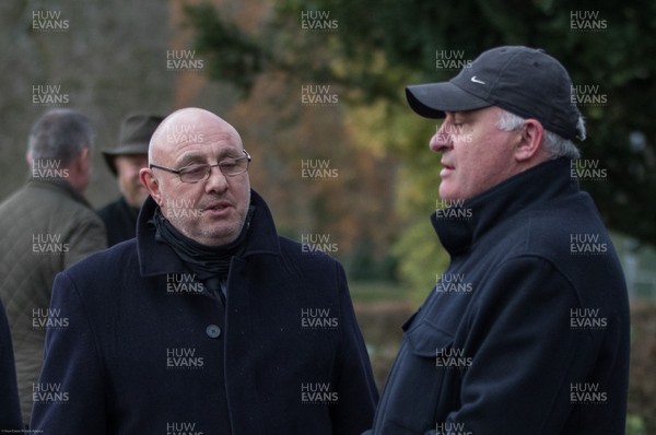 081220 -  Former players David Bishop, left and Mark Ring catch up as they wait to pay their respects ahead of the funeral cortege of Pontypool RFC legend Ray Prosser which made  its way through Pontypool Park past Pontypool's clubhouse and ground