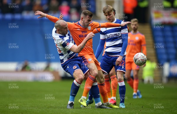 250120 - Reading FC v Cardiff City, The Emirates FA Cup, Fourth Round - Joe Ralls of Cardiff City is tackled by Charlie Adam of Reading