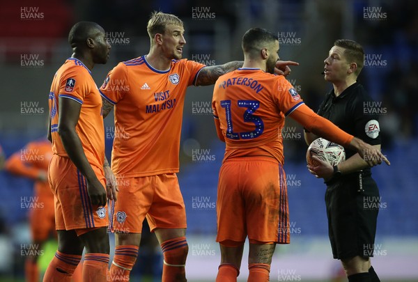 250120 - Reading FC v Cardiff City, The Emirates FA Cup, Fourth Round - Souleymane Bamba, Aden Flint and Callum Paterson of Cardiff City speak to referee Marc Edwards