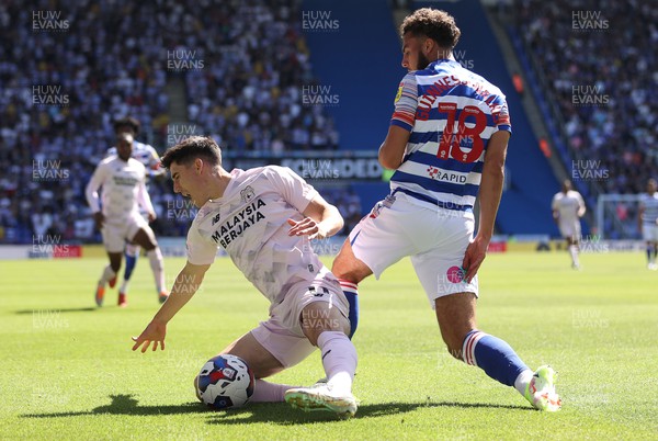 060822 - Reading v Cardiff City - SkyBet Championship - Callum O'Dowda of Cardiff City is tackled by Nesta Guinness-Walker of Reading