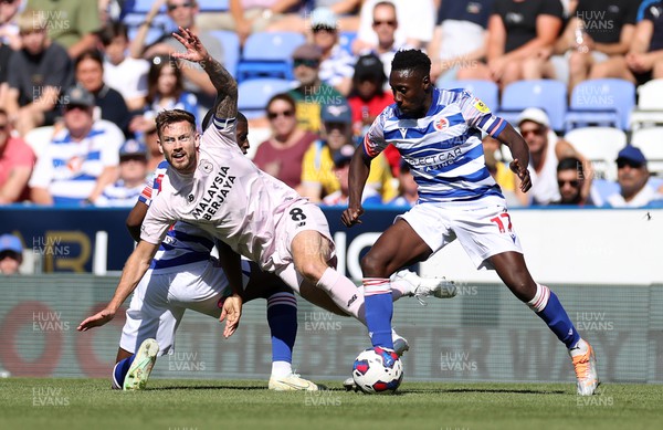 060822 - Reading v Cardiff City - SkyBet Championship - Joe Ralls of Cardiff City is tackled by Tyrese Fornah of Reading