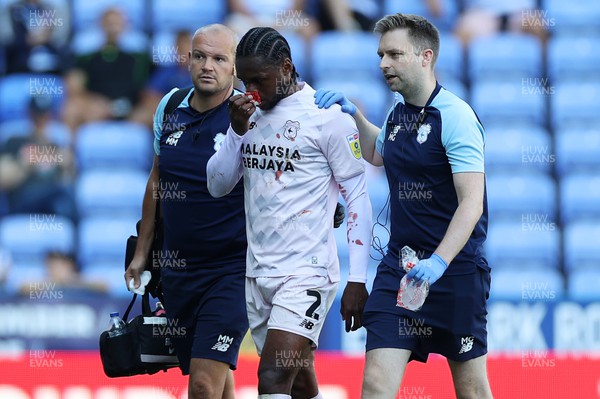 060822 - Reading v Cardiff City - SkyBet Championship - Mahlon Romeo of Cardiff City leaves the field with a bloody nose