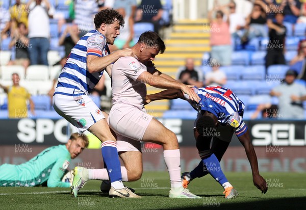 060822 - Reading v Cardiff City - SkyBet Championship - Tempers boil over between Mark Harris of Cardiff City and Andy Yiadom of Reading