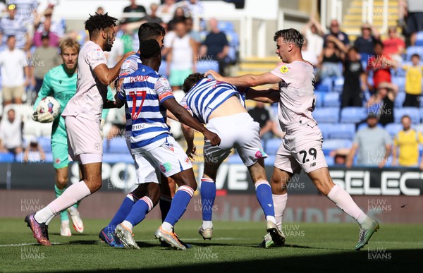 060822 - Reading v Cardiff City - SkyBet Championship - Tempers boil over between Mark Harris of Cardiff City, Andy Yiadom and Tom Holmes of Reading