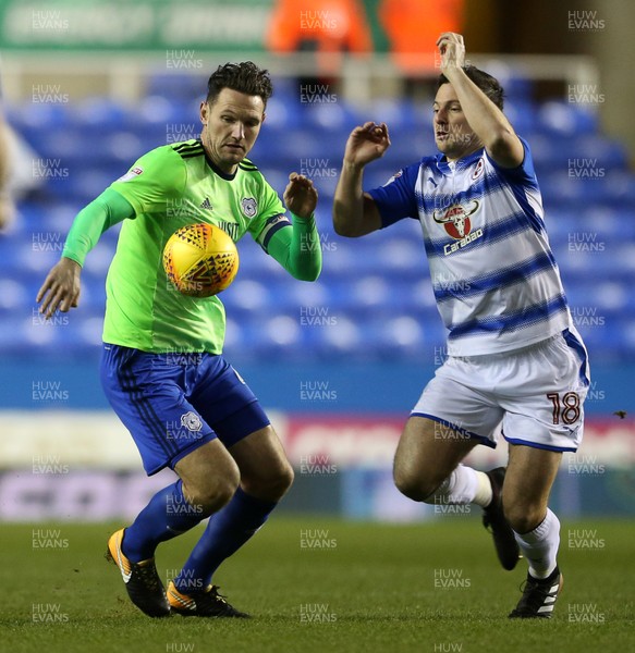 111217 - Reading v Cardiff City - SkyBet Championship - Sean Morrison of Cardiff City is challenged by Yann Kermorgant of Reading