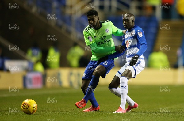 111217 - Reading v Cardiff City - SkyBet Championship - Modou Barrow of Reading is challenged by Bruno Ecuele Manga of Cardiff City