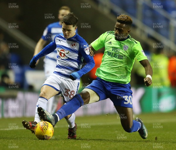 111217 - Reading v Cardiff City - SkyBet Championship - Liam Kelly of Reading is tackled by Omar Bogle of Cardiff City