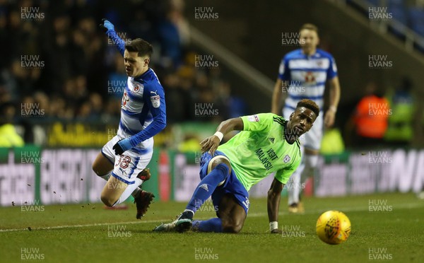 111217 - Reading v Cardiff City - SkyBet Championship - Liam Kelly of Reading is tackled by Omar Bogle of Cardiff City