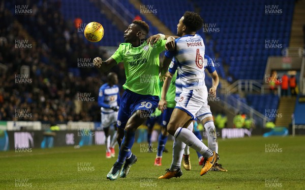 111217 - Reading v Cardiff City - SkyBet Championship - Omar Bogle of Cardiff City is challenged by Liam Moore of Reading