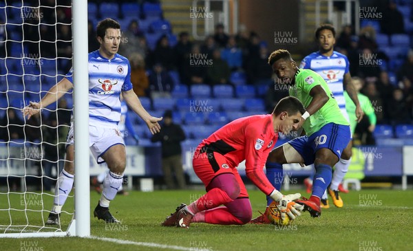 111217 - Reading v Cardiff City - SkyBet Championship - Omar Bogle of Cardiff City kicks the ball out of keeper Vito Mannone hands but can't get past Yann Kermorgant of Reading