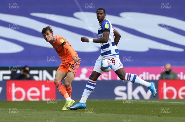 160421 Reading v Cardiff City, Sky Bet Championship - Tom Sang of Cardiff City plays the ball past Lucas Joao of Reading