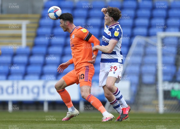 160421 Reading v Cardiff City, Sky Bet Championship - Kieffer Moore of Cardiff City wins the ball from Tom Holmes of Reading