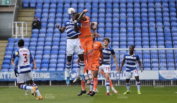 160421 Reading v Cardiff City, Sky Bet Championship - Aden Flint of Cardiff City and Lucas Joao of Reading compete for the ball